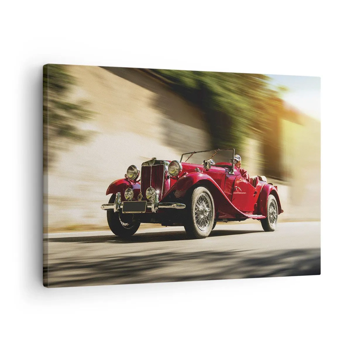 Obraz na plátně - Červené klasické auto v pohybu na slunné ulici - 70x50cm - Krásnější než Níké Samothrácká - Moderní nástěnná dekorace do obývacího pokoje a ložnice ARTTOR